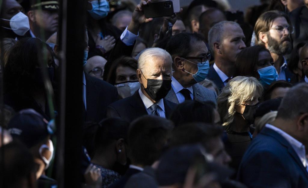 A presidir à cerimónia estava o Presidente norte-americano, Joe Biden, ladeado por vários dos seus antecessores. Justin Lane/EPA