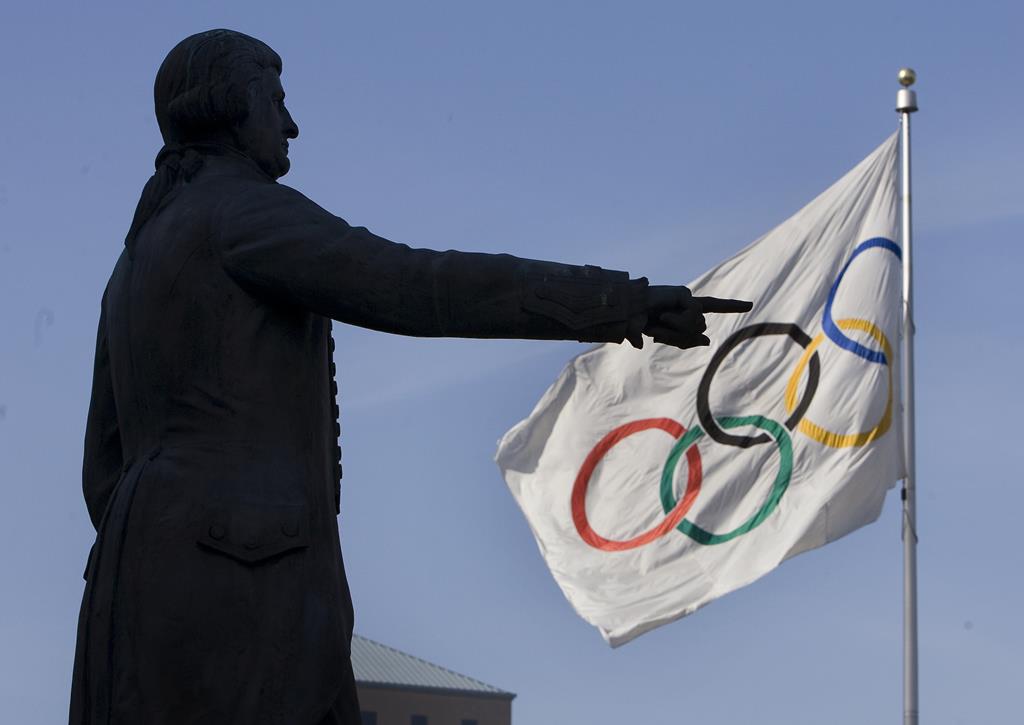 Esta é a forma correta de hastear a bandeira Olímpica. Foto: Reuters