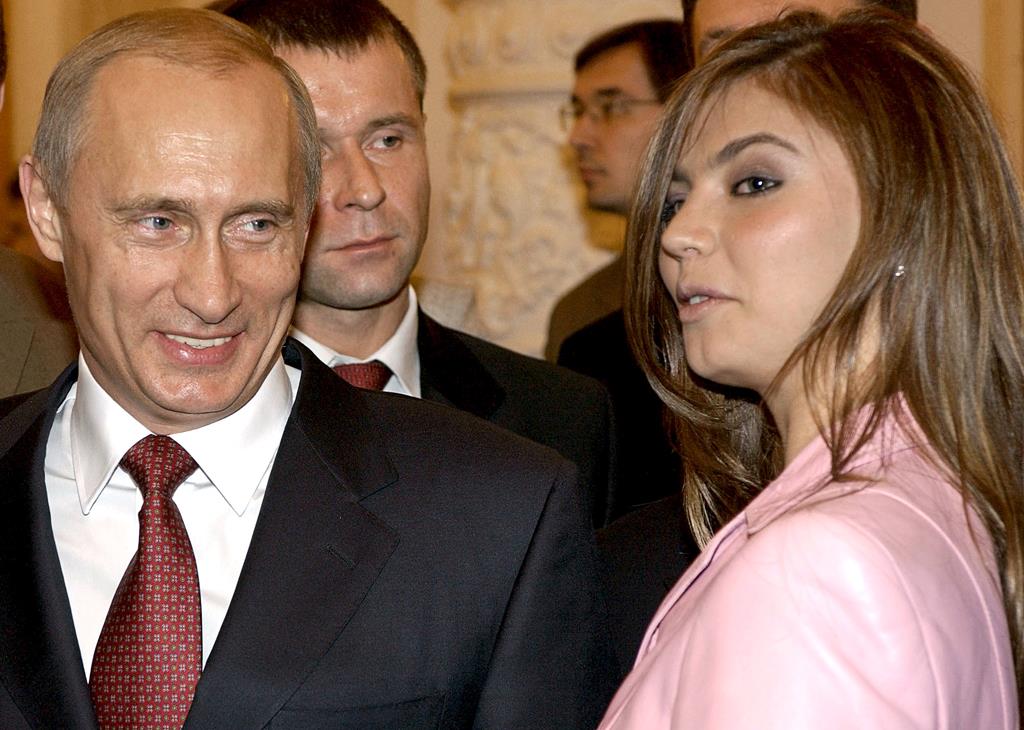Vladimir Putin e a alegada namorada, Alina Kabaeva. Foto: REUTERS/ITAR-TASS/PRESIDENTIAL PRESS SERVICE