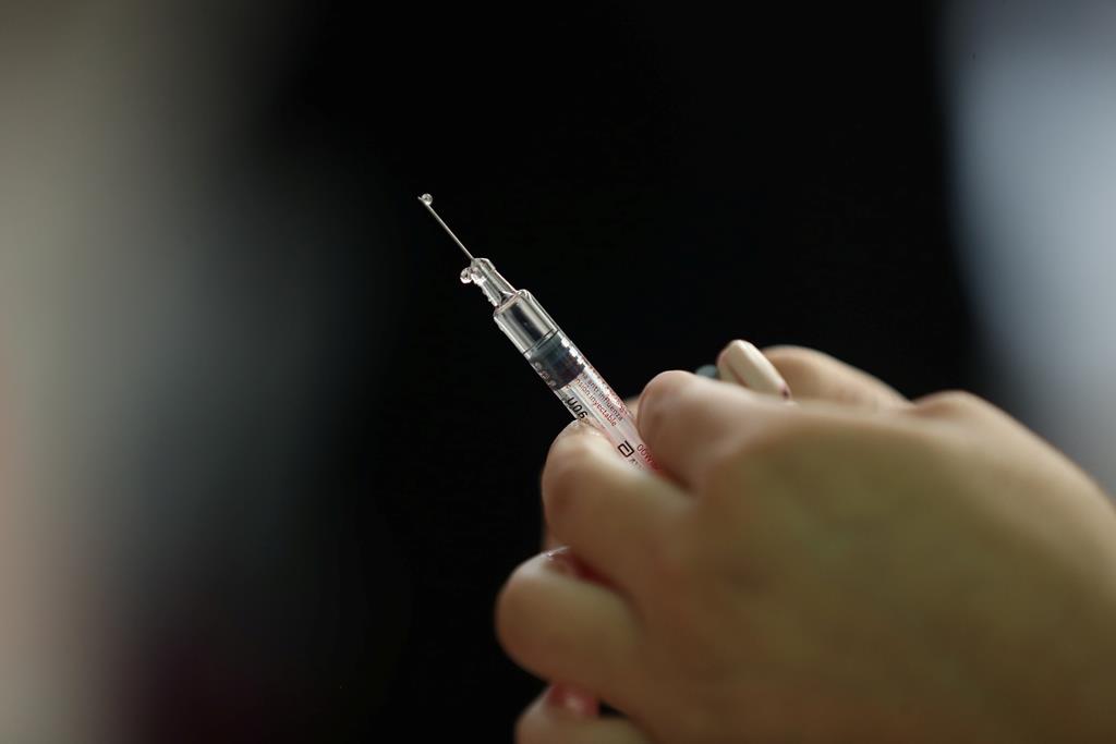 Vacina da gripe sazonal. Foto: Ivan Alvarado/Reuters