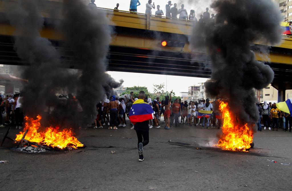  Venezuela em caos após vitória de Nicolás Maduro