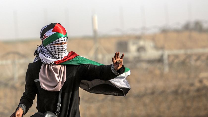 Palestiniana em protesto em Gaza. Foto: Mohammed Saber/EPA