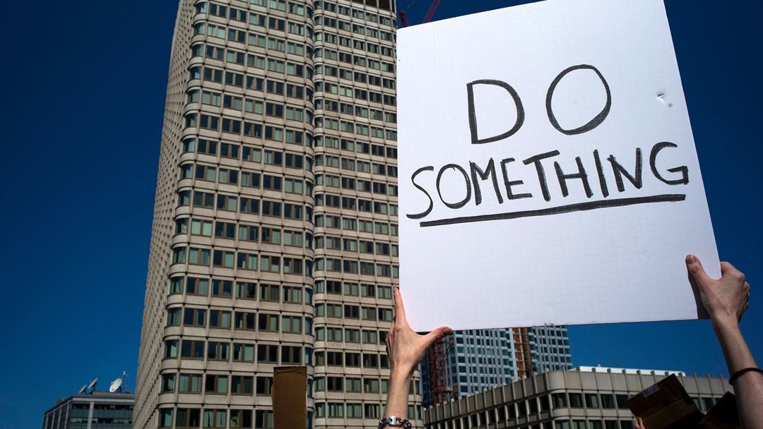 "Façam alguma coisa", pediram os manifestantes em Boston, nos Estados Unidos. Foto: CJ Gunther/EPA