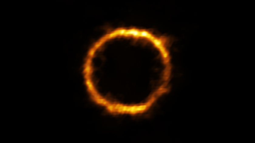 Imagem de SPT0418-47 sob o efeito de lente gravitacional. Foto: ALMA (ESO/NAOJ/NRAO), Rizzo et al