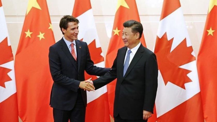 O primeiro-ministro canadiano Justin Trudeau e o Presidente chinês Xi Jinping. Foto: Wu Hong/Reuters