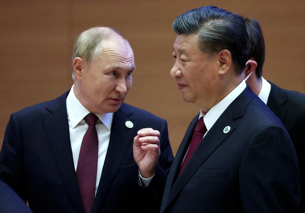 Vladimir Putin e Xi Jinping. Foto: Sergey Bobylev/Reuters