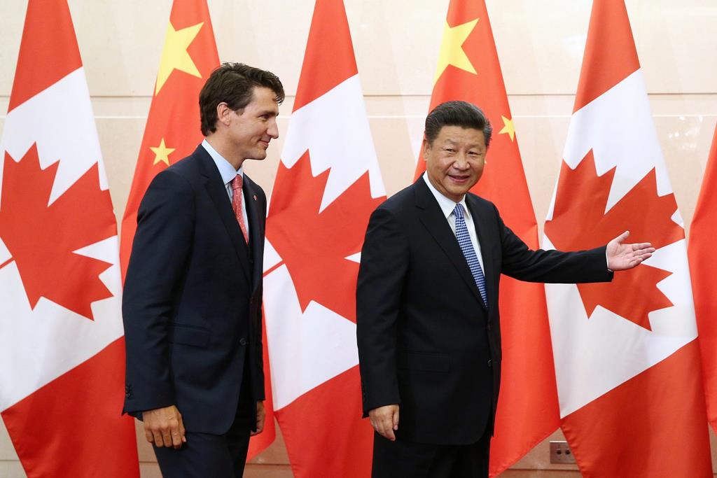 O Presidente da China, Xi Jinping, com o primeiro-ministro do Canadá, Justin Trudeau. Foto: DR